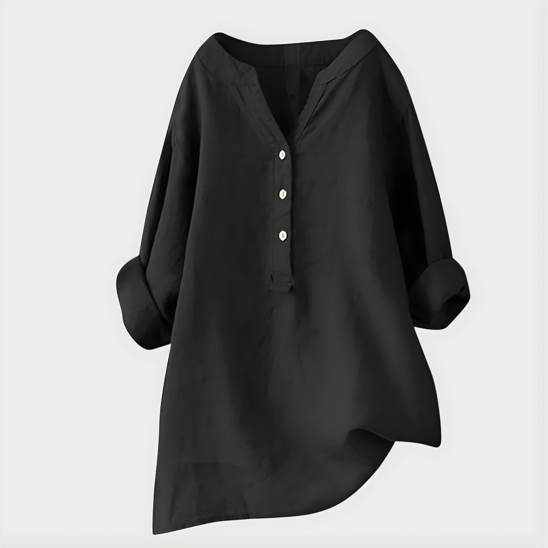 Woman wearing a relaxed cotton-linen V-neck blouse with soft draping