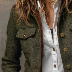 Olive herringbone blazer with contrast collar and cuff trim and structured tailored silhouette