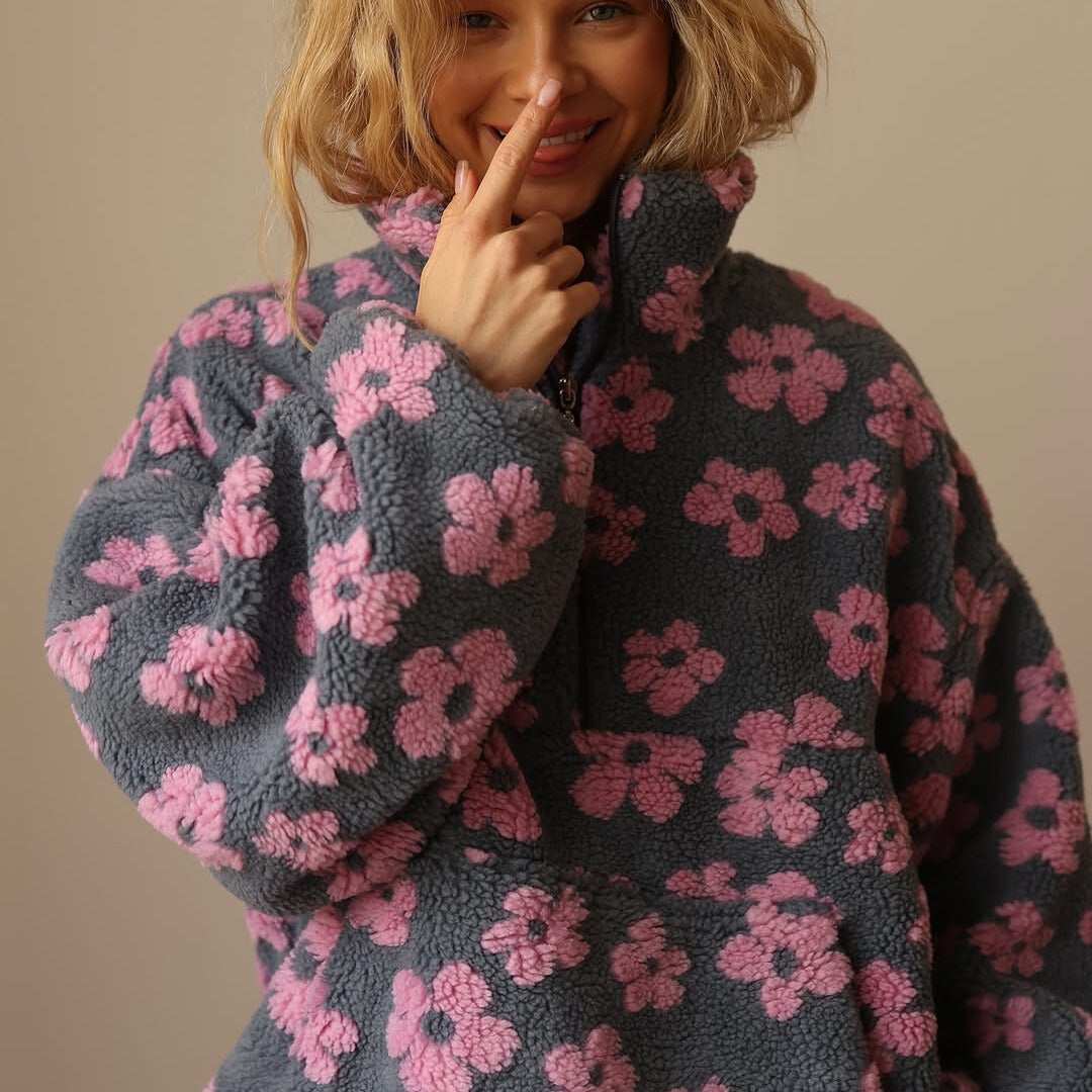 Women's floral quarter-zip sweater with stand collar and gathered cuffs in a relaxed fit