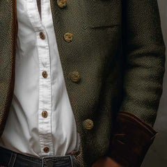 Olive herringbone blazer with contrast collar and cuff trim and structured tailored silhouette