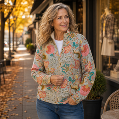 Gray zip-up cardigan with coral, turquoise and gold floral print and standing collar