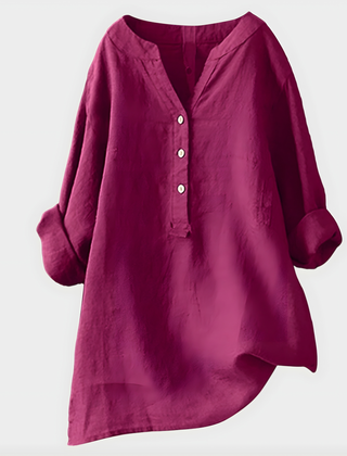 Woman wearing a relaxed cotton-linen V-neck blouse with soft draping