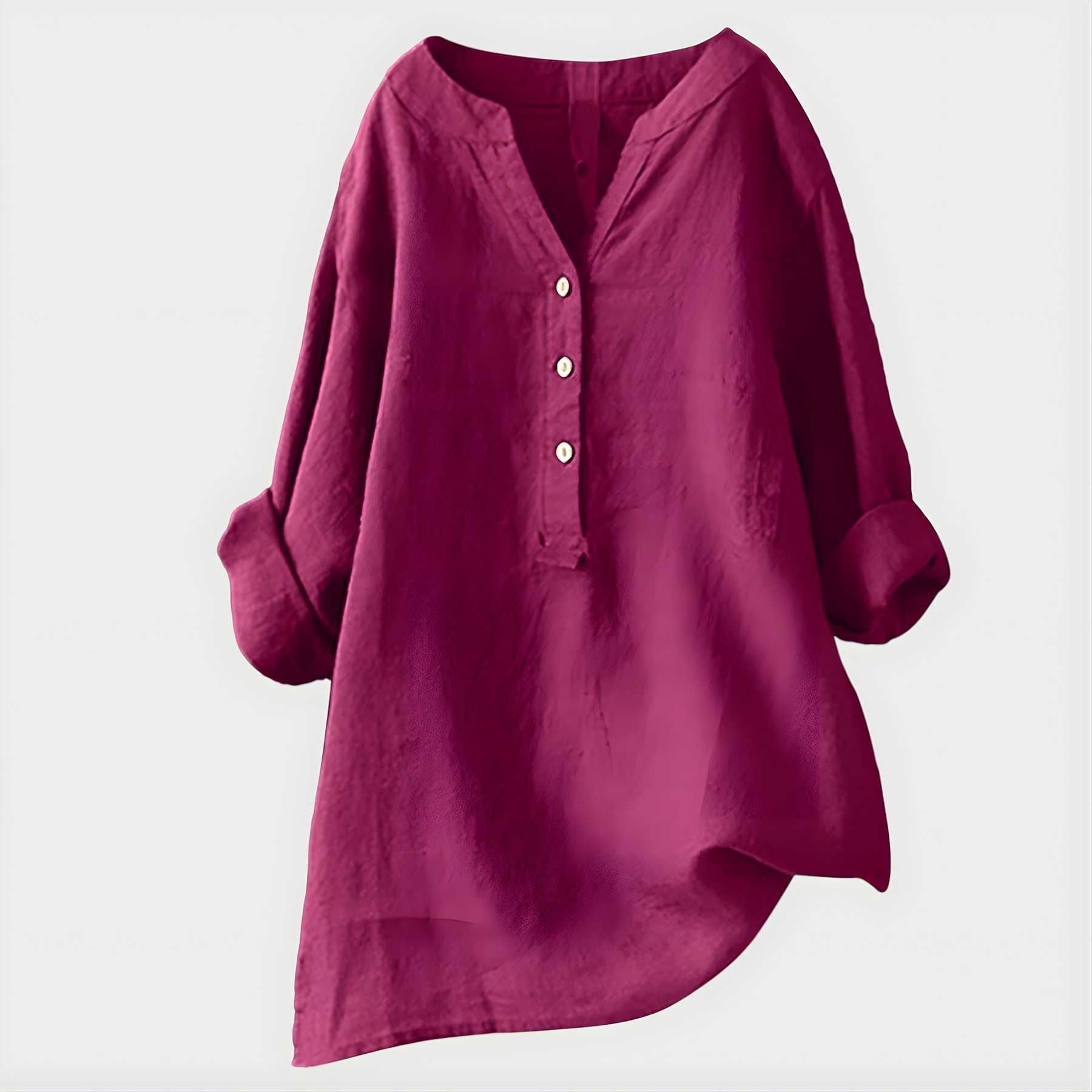 Woman wearing a relaxed cotton-linen V-neck blouse with soft draping