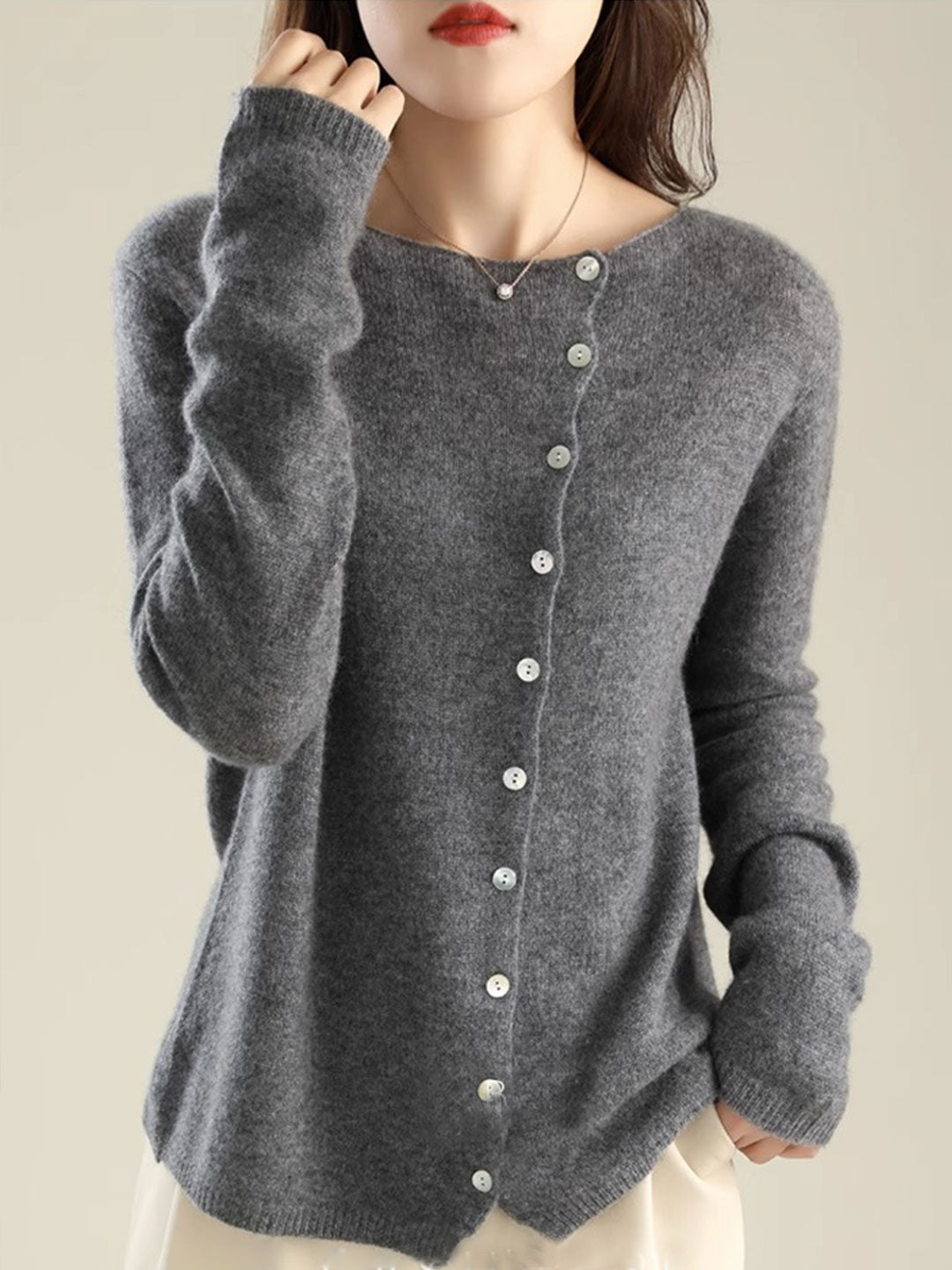 Women's V-neck button-front long sleeve cardigan with softly shaped collar and hip-length hem