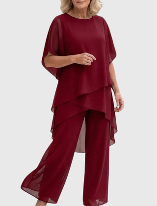Women's flowing chiffon top with matching wide-leg trousers two-piece set