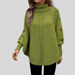 High-neck cable-knit sweater with ribbed turtleneck, shoulder buttons and relaxed oversized fit