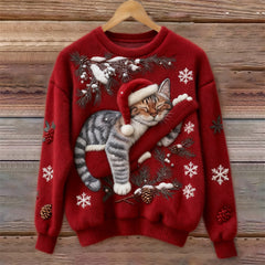 Women's crew neck sweater with a festive cat graphic and winter motifs, long sleeves and ribbed cuffs