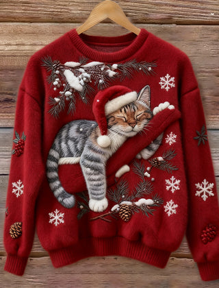 Women's crew neck sweater with a festive cat graphic and winter motifs, long sleeves and ribbed cuffs