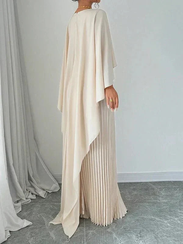 Elegant pleated cape maxi dress with flowing overlay and floor-length skirt