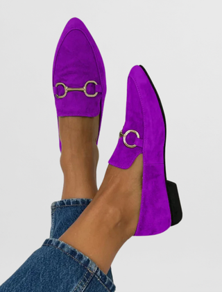 Colourful handmade women's moccasins in blue, yellow, green and purple