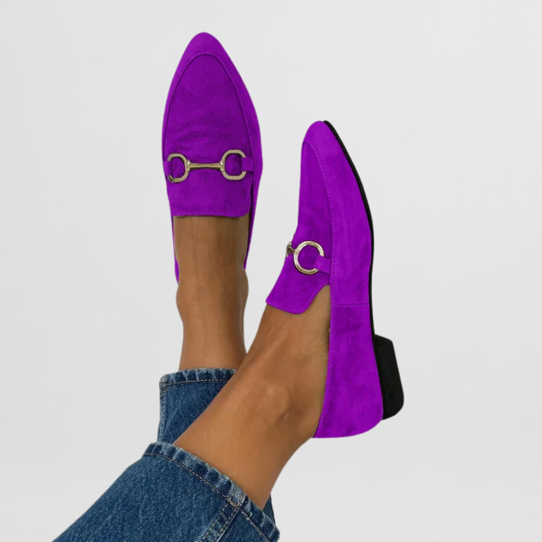 Colourful handmade women's moccasins in blue, yellow, green and purple