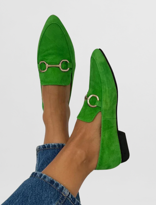 Colourful handmade women's moccasins in blue, yellow, green and purple