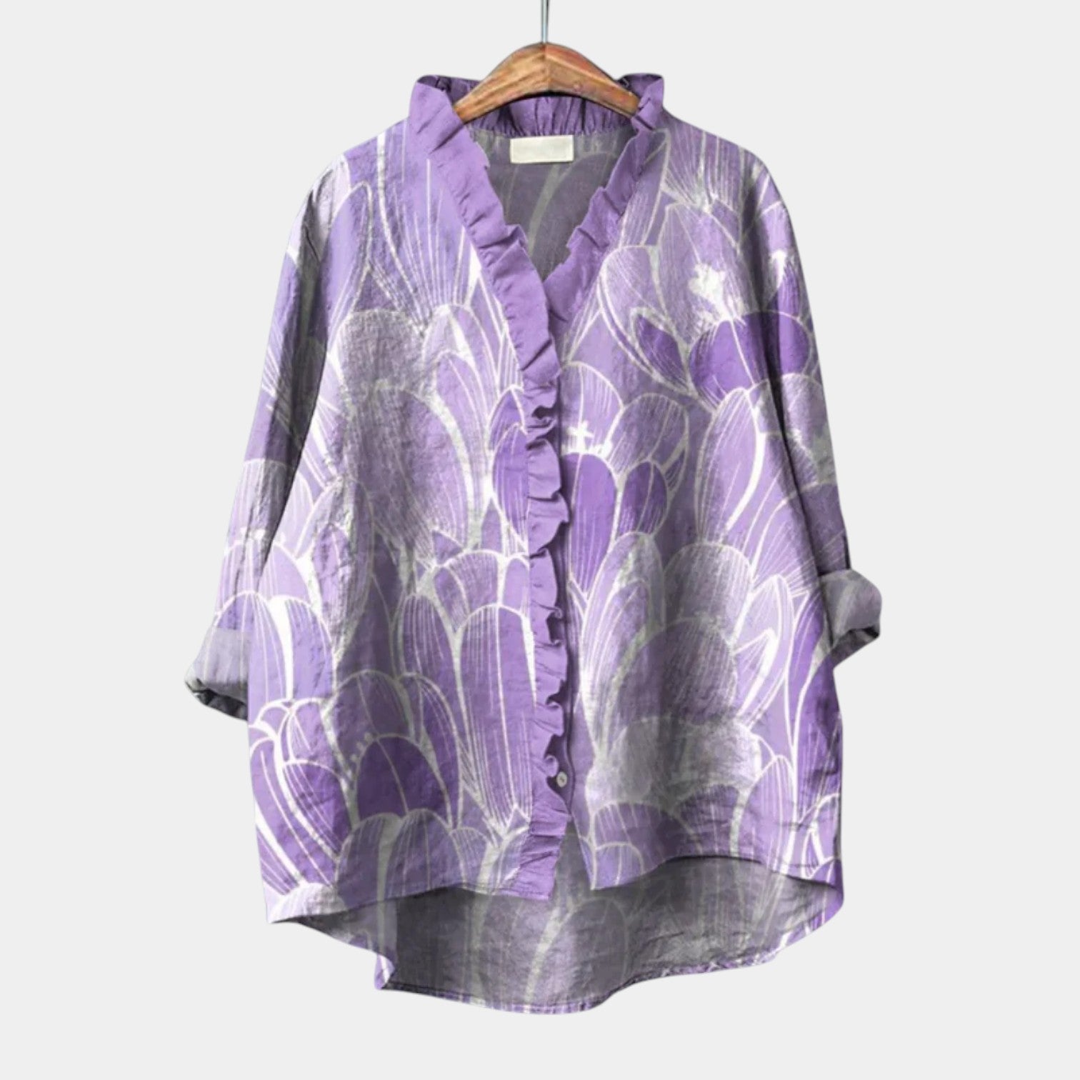 Elegant printed long-sleeve summer blouse for women, styled with simple trousers