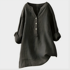 Woman wearing a relaxed cotton-linen V-neck blouse with soft draping