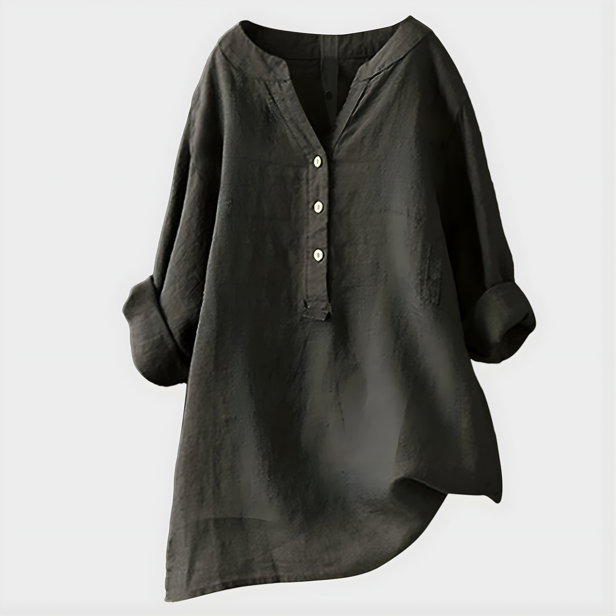 Woman wearing a relaxed cotton-linen V-neck blouse with soft draping