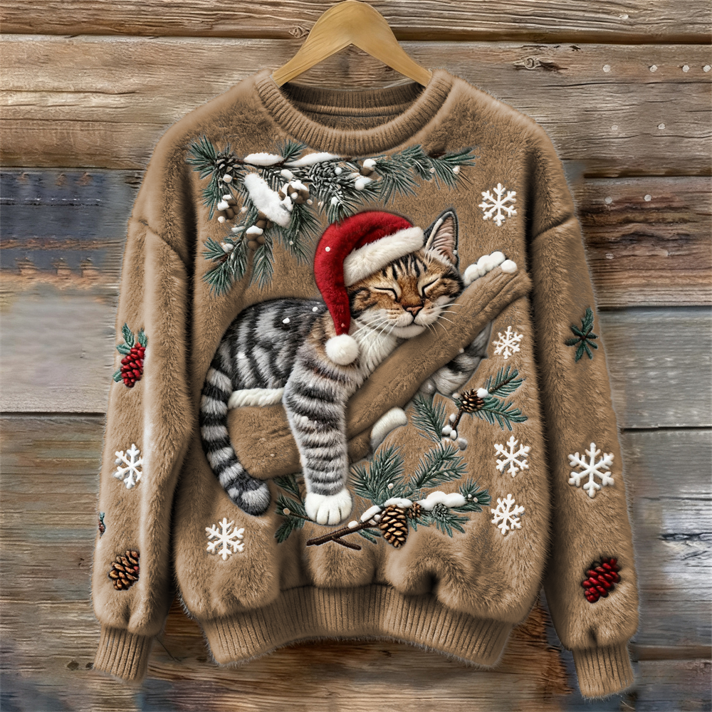 Women's crew neck sweater with a festive cat graphic and winter motifs, long sleeves and ribbed cuffs