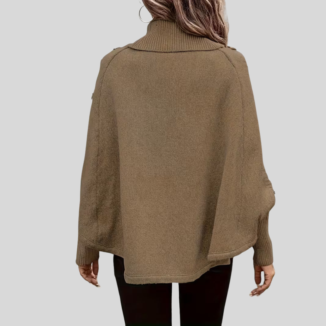 High-neck cable-knit sweater with ribbed turtleneck, shoulder buttons and relaxed oversized fit