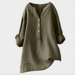 Woman wearing a relaxed cotton-linen V-neck blouse with soft draping