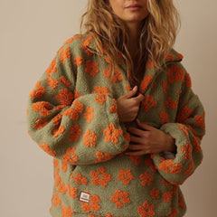 Women's floral quarter-zip sweater with stand collar and gathered cuffs in a relaxed fit