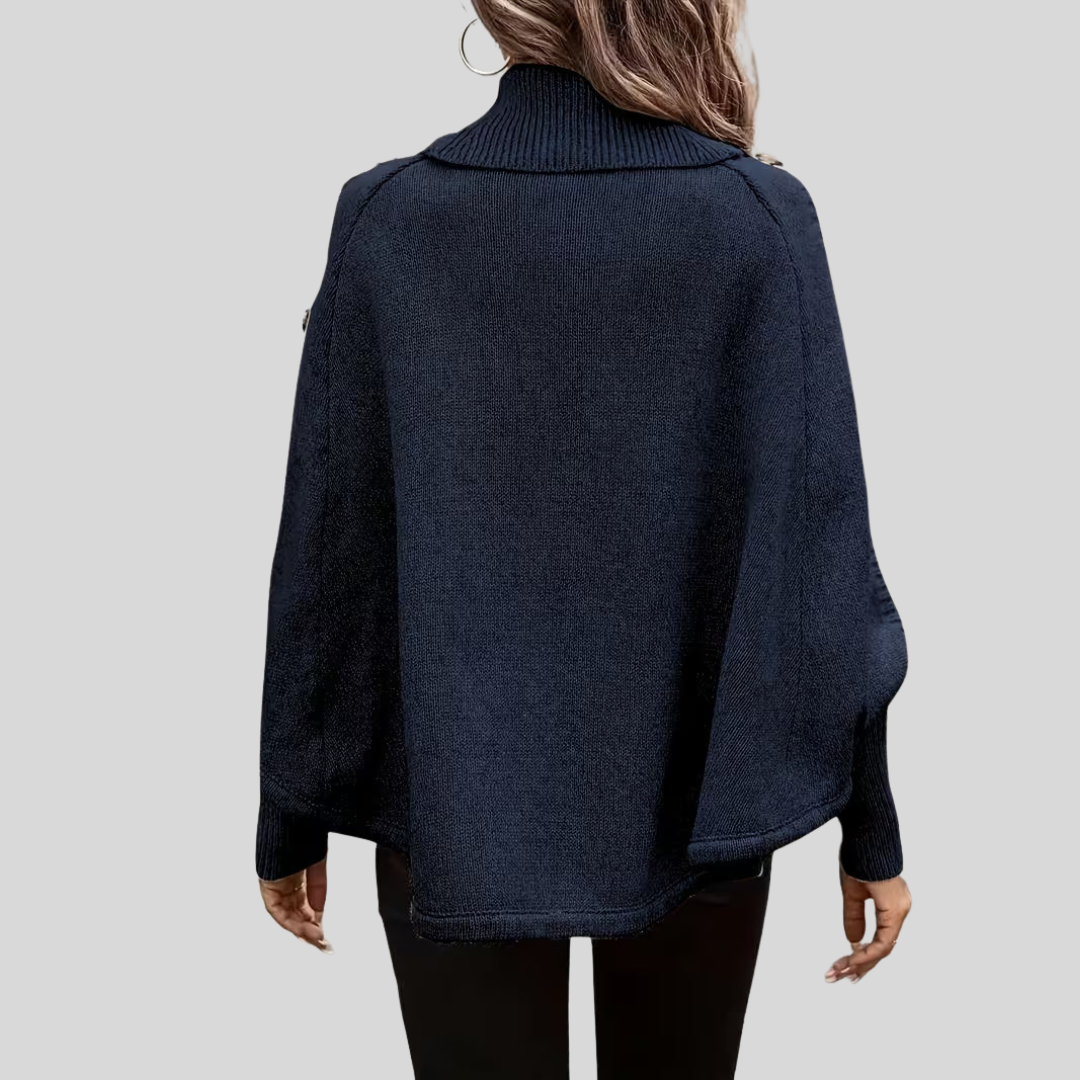 High-neck cable-knit sweater with ribbed turtleneck, shoulder buttons and relaxed oversized fit