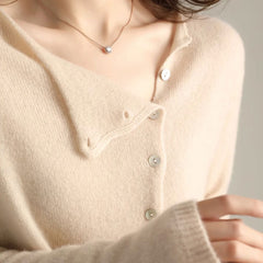 Women's V-neck button-front long sleeve cardigan with softly shaped collar and hip-length hem