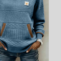 Women's crew neck colorblock sweatshirt with quilted texture panels and front kangaroo pocket