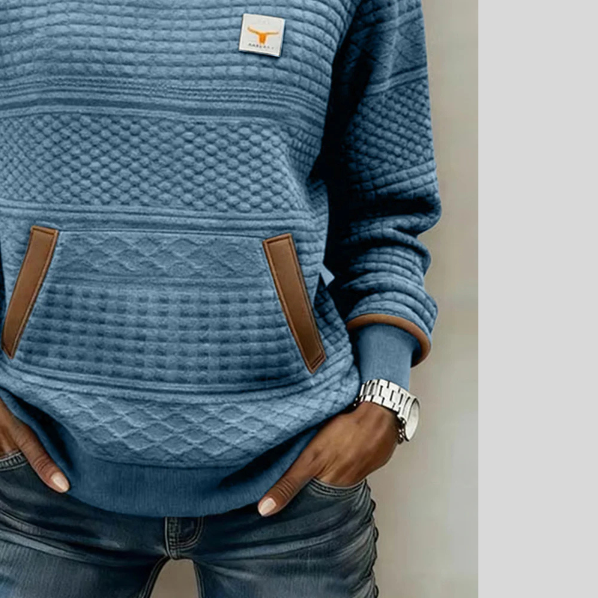 Women's crew neck colorblock sweatshirt with quilted texture panels and front kangaroo pocket