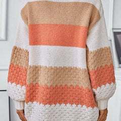 Woman wearing an oversized slouchy open-front knit cardigan with long sleeves