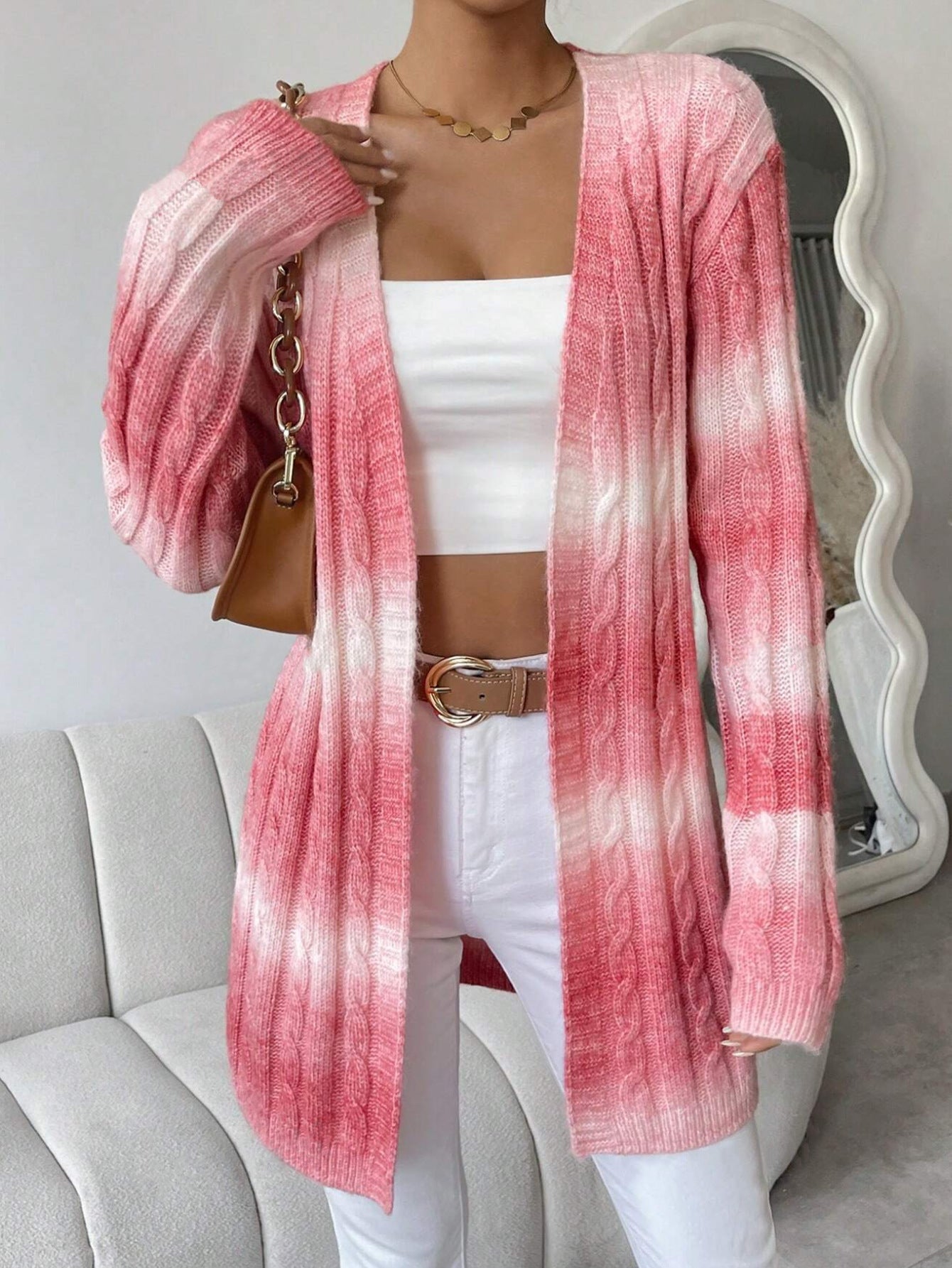 Long open-front soft knit duster cardigan with relaxed drape and long sleeves