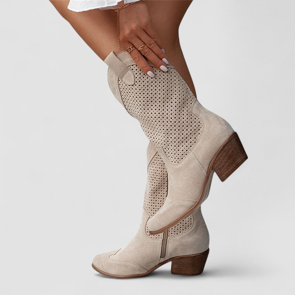 Perforated Western boots with pointed toe and block heel, shown in white, beige, black and brown