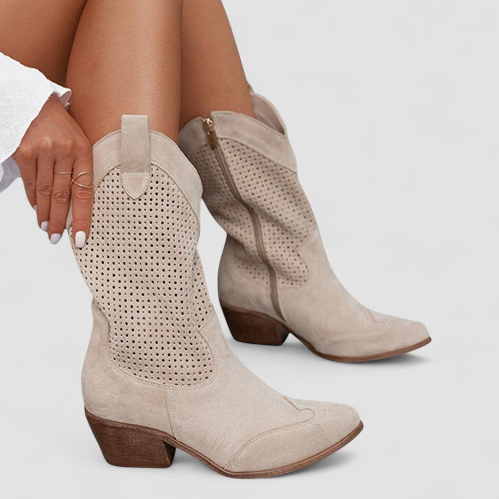 Perforated Western boots with pointed toe and block heel, shown in white, beige, black and brown