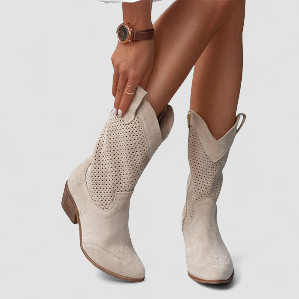 Perforated Western boots with pointed toe and block heel, shown in white, beige, black and brown