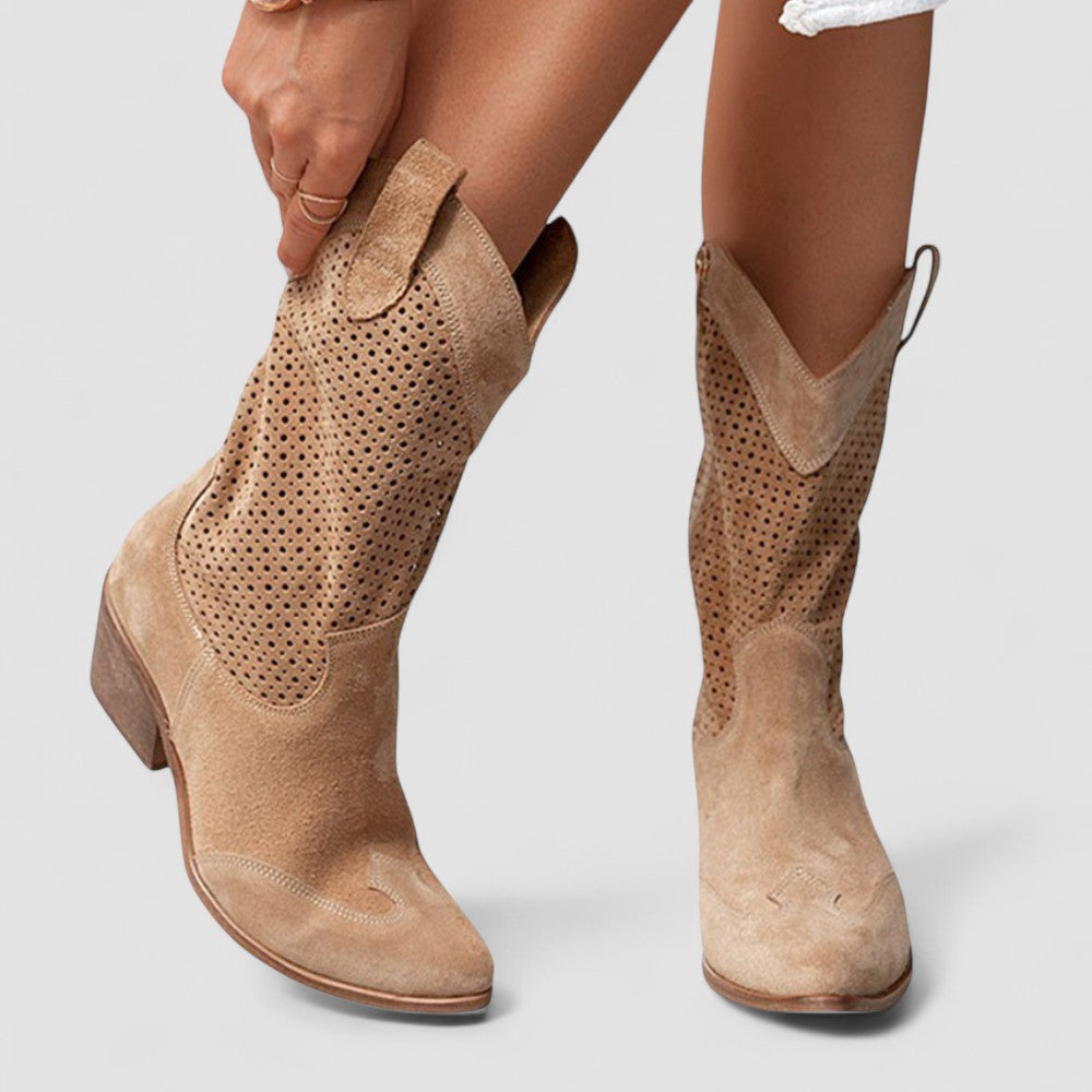 Perforated Western boots with pointed toe and block heel, shown in white, beige, black and brown
