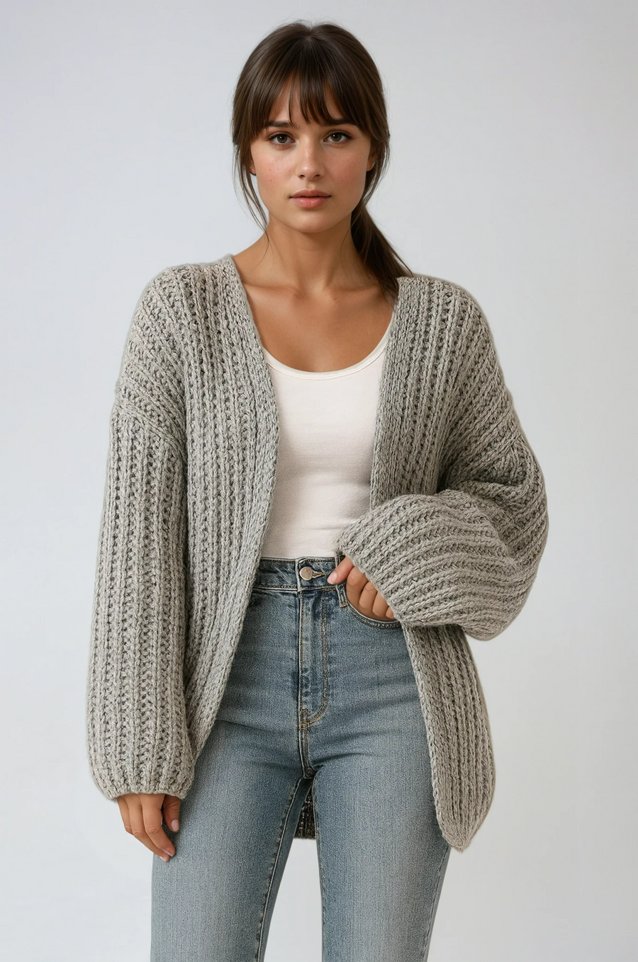 Oversized chunky knit cardigan with lantern sleeves and slouchy open-front silhouette