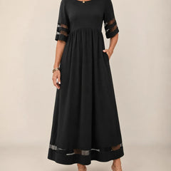 Aubrey A-line midi dress with half sleeves and sheer detailing on sleeves and hem