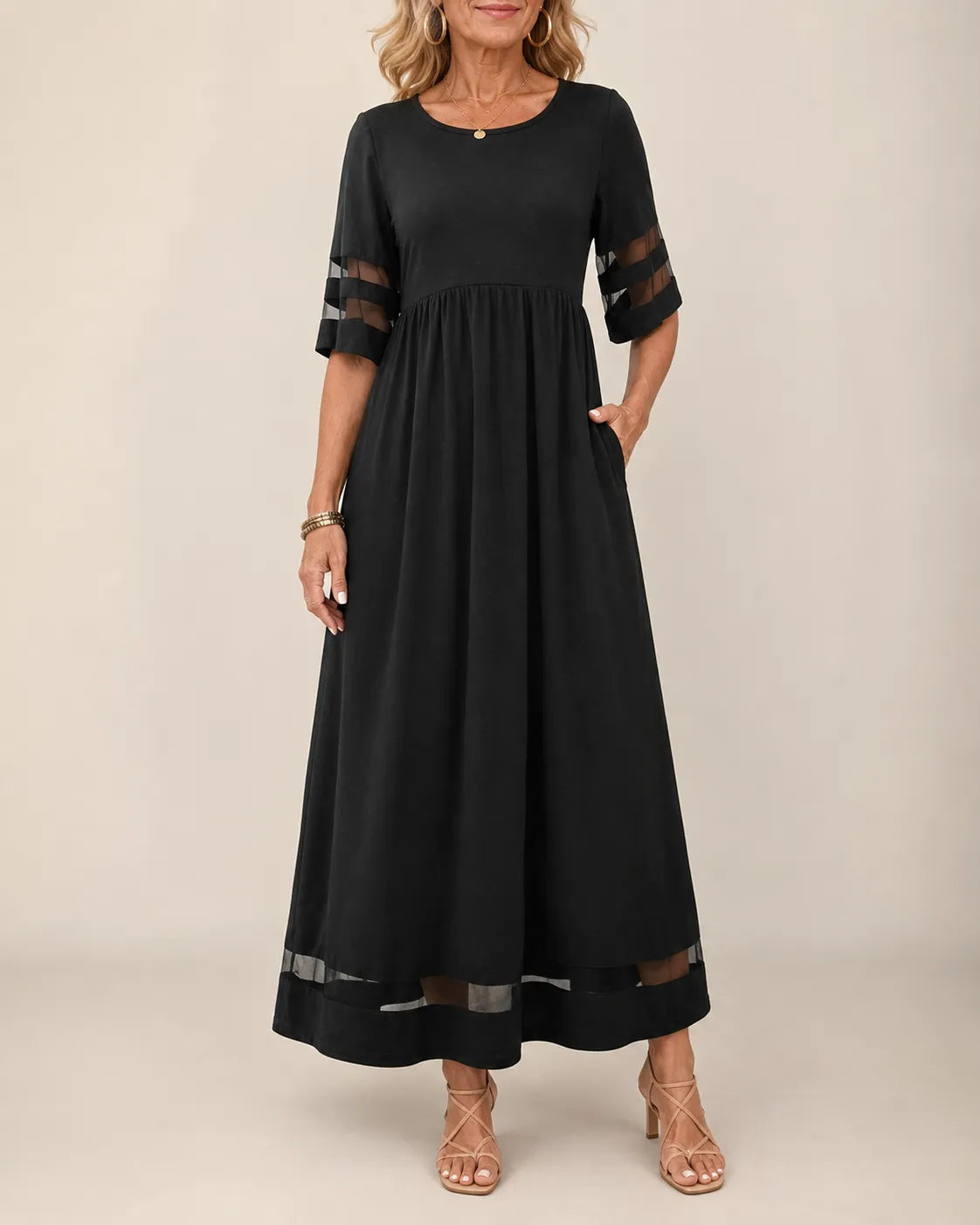 Aubrey A-line midi dress with half sleeves and sheer detailing on sleeves and hem