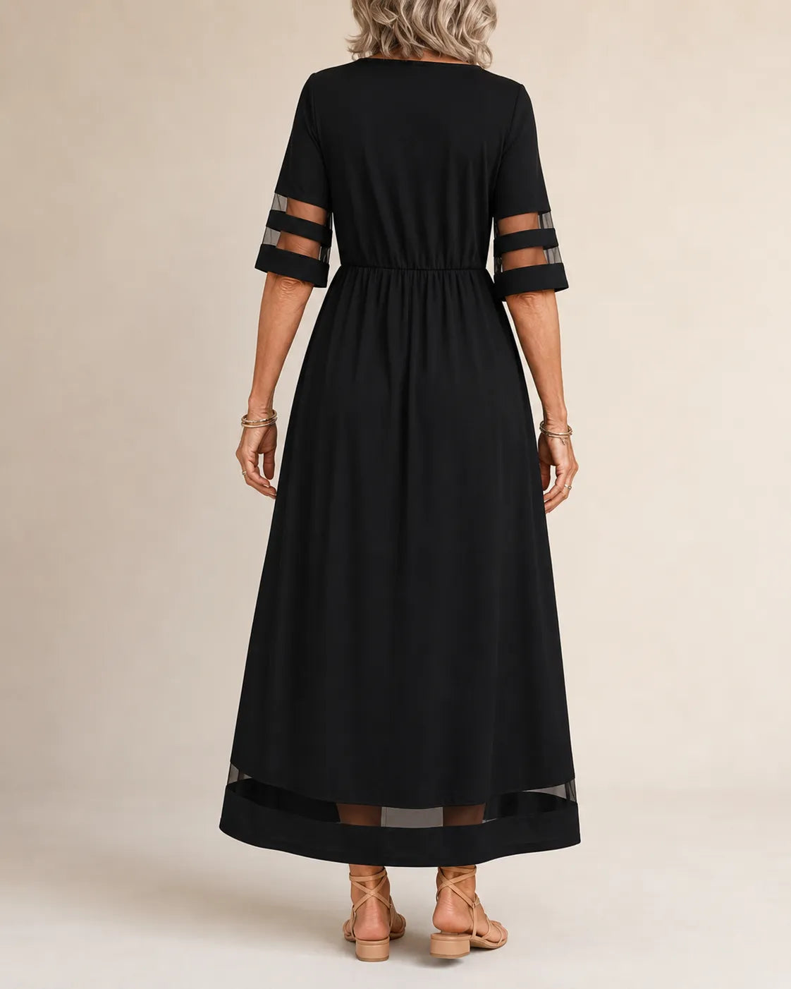 Aubrey A-line midi dress with half sleeves and sheer detailing on sleeves and hem