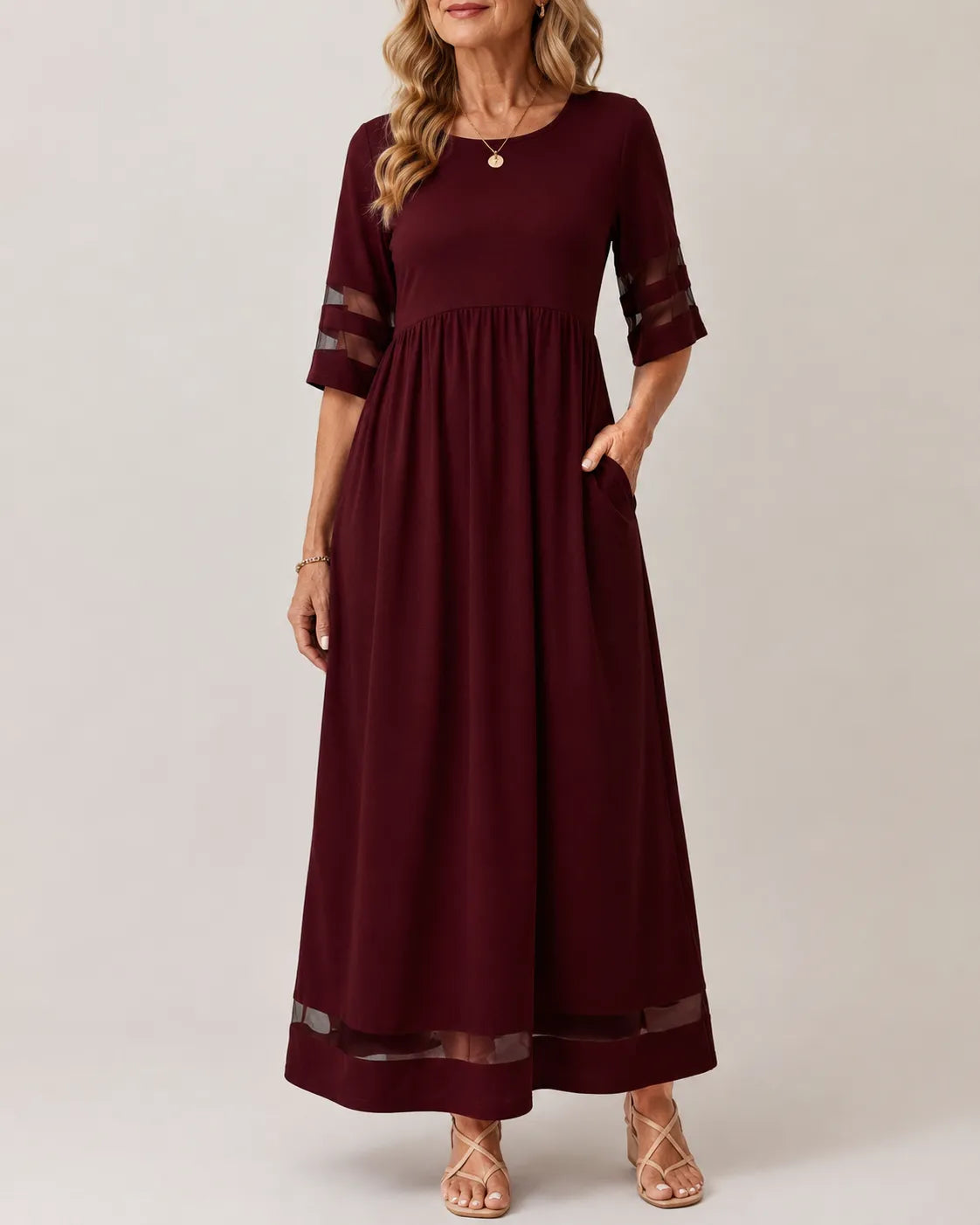 Aubrey A-line midi dress with half sleeves and sheer detailing on sleeves and hem