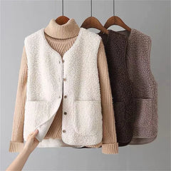 Women's matching set with button-front sleeveless vest and long-sleeve top in a neutral tone