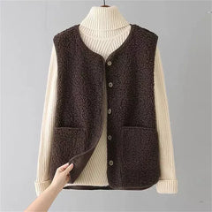 Women's matching set with button-front sleeveless vest and long-sleeve top in a neutral tone