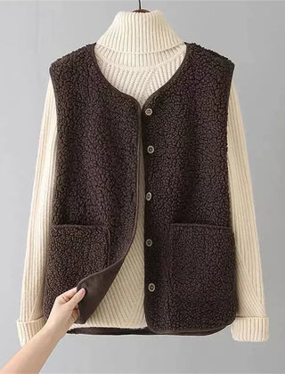 Women's matching set with button-front sleeveless vest and long-sleeve top in a neutral tone