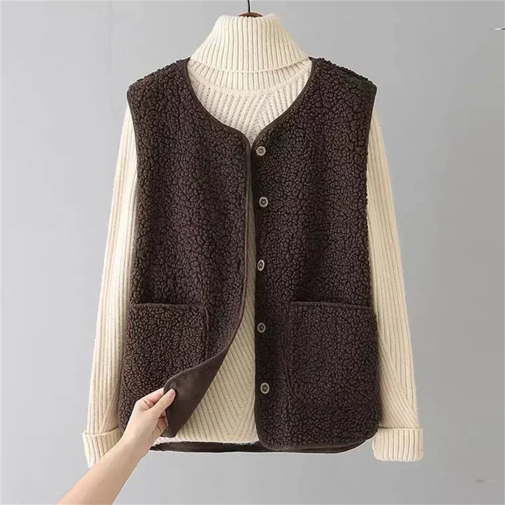 Women's matching set with button-front sleeveless vest and long-sleeve top in a neutral tone