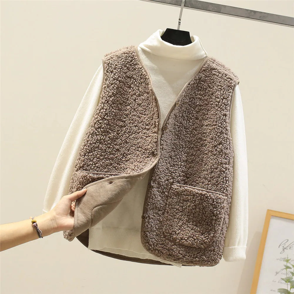 Women's matching set with button-front sleeveless vest and long-sleeve top in a neutral tone