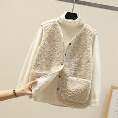 Women's matching set with button-front sleeveless vest and long-sleeve top in a neutral tone