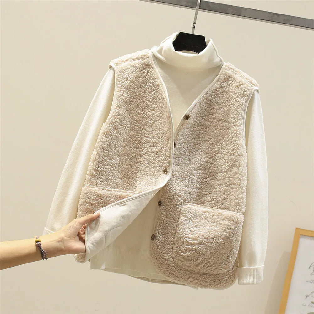 Women's matching set with button-front sleeveless vest and long-sleeve top in a neutral tone