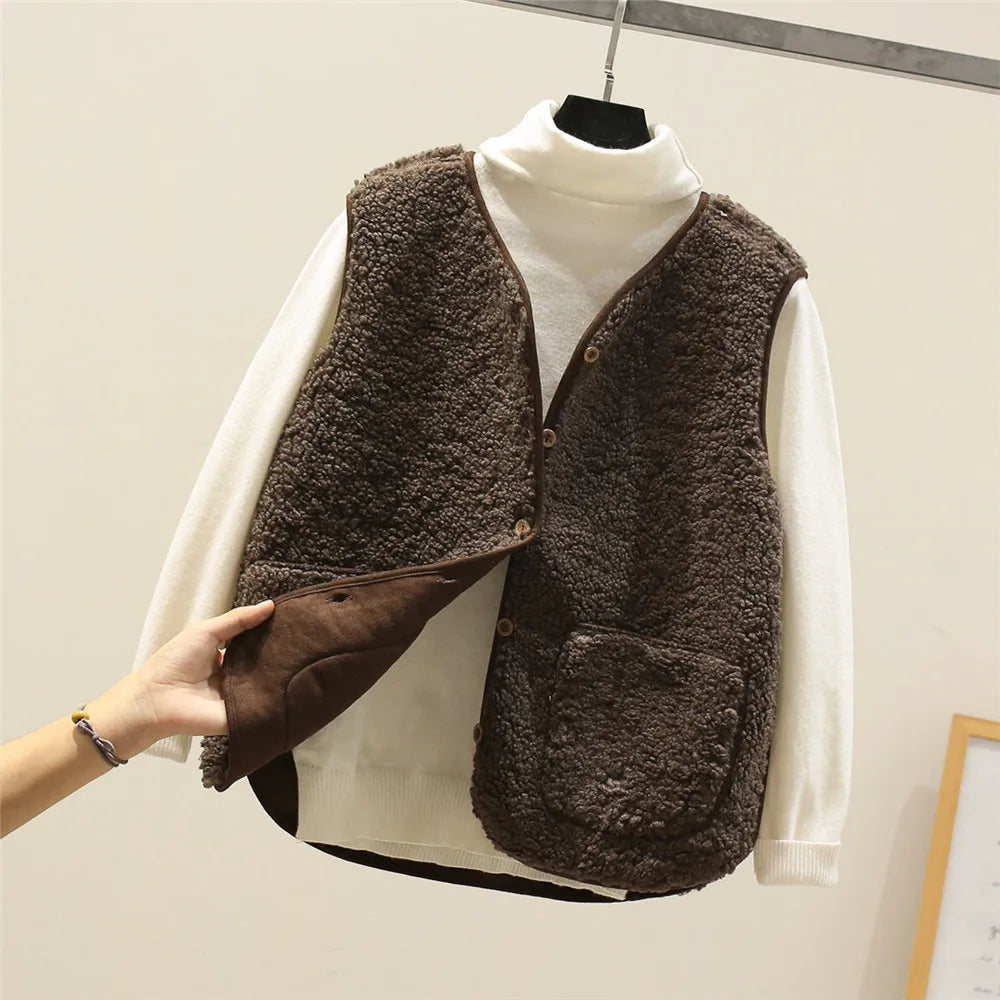 Women's matching set with button-front sleeveless vest and long-sleeve top in a neutral tone