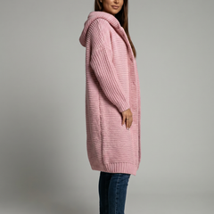Women's hooded oversized chunky knit cardigan with large buttons in a soft neutral shade
