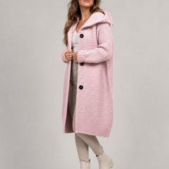 Women's hooded oversized chunky knit cardigan with large buttons in a soft neutral shade