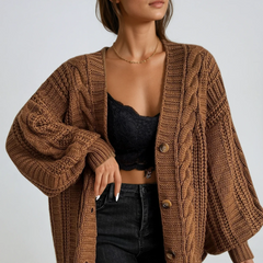 Oversized cable knit cardigan with dropped shoulders, slouchy sleeves and ribbed trim