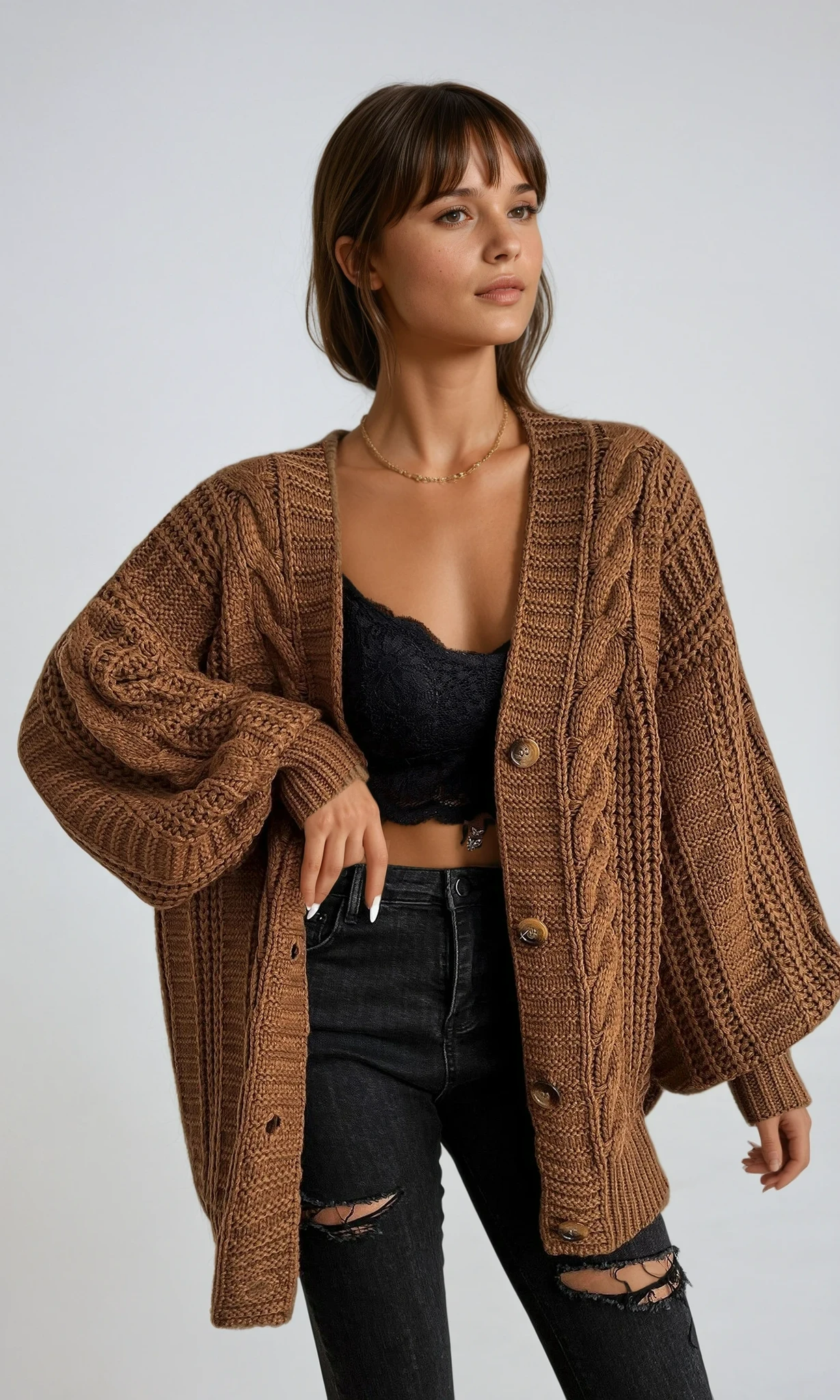 Oversized cable knit cardigan with dropped shoulders, slouchy sleeves and ribbed trim